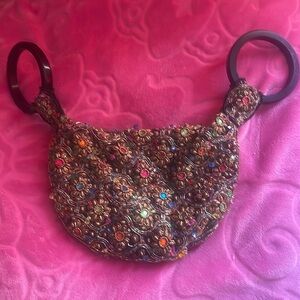 Ricki designs jeweled purse